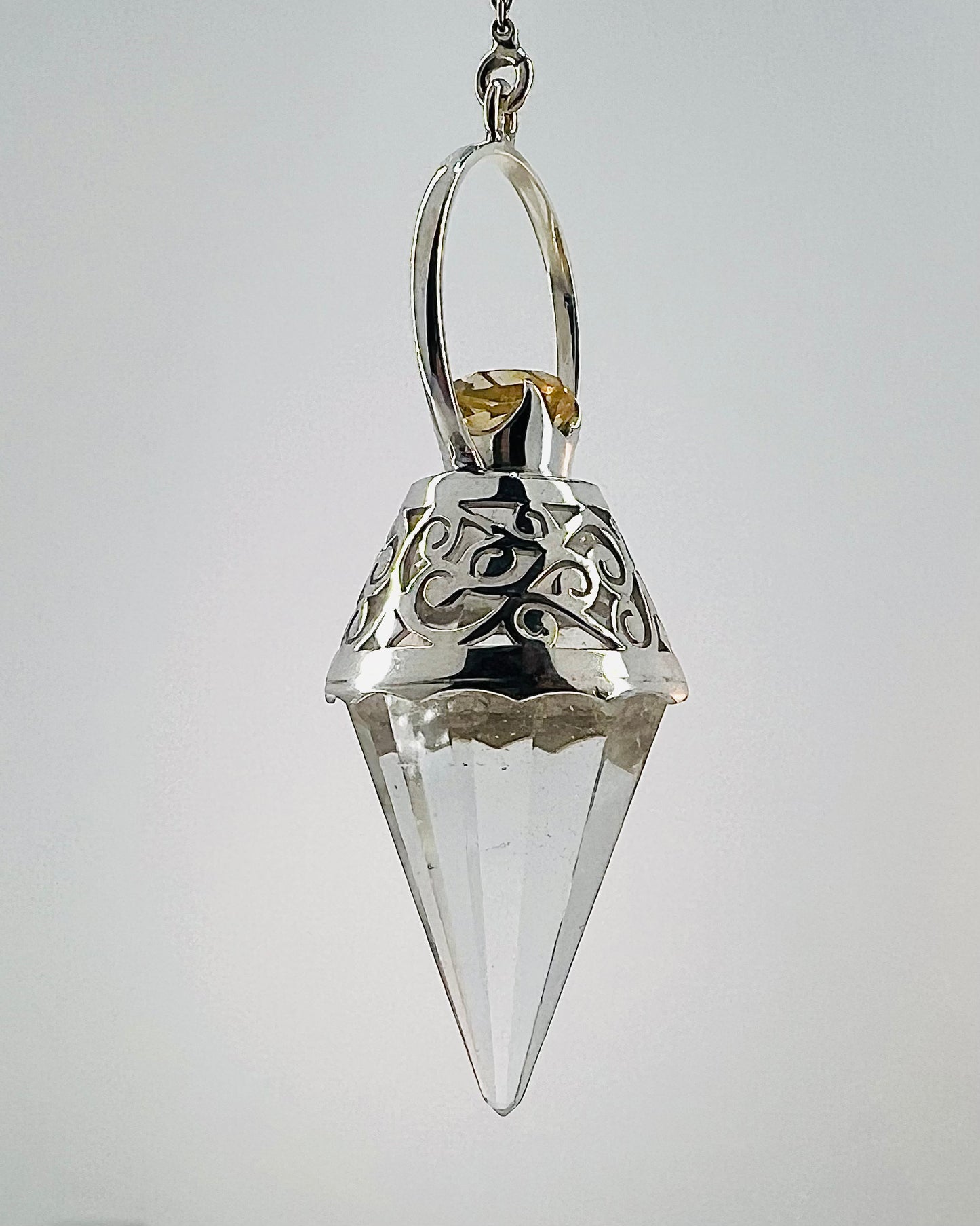 Vogel Cut Crystal Point with Facetted Citrines in Fancy .925 Silver Setting with Cutwork Design as a Pendulum