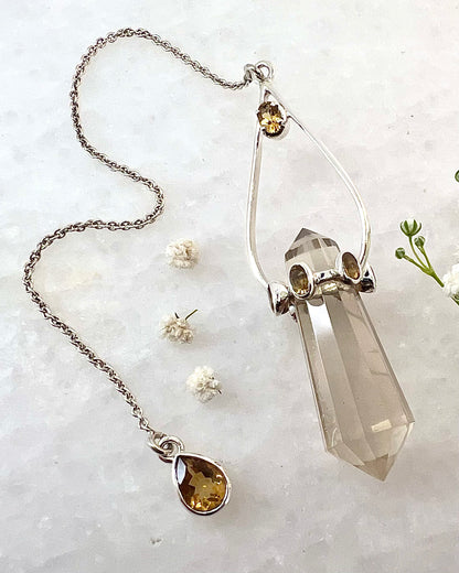 Vogel Cut Double Terminated Crystal Point with 7 Facetted Citrines in .925 Silver Setting  as a Pendulum