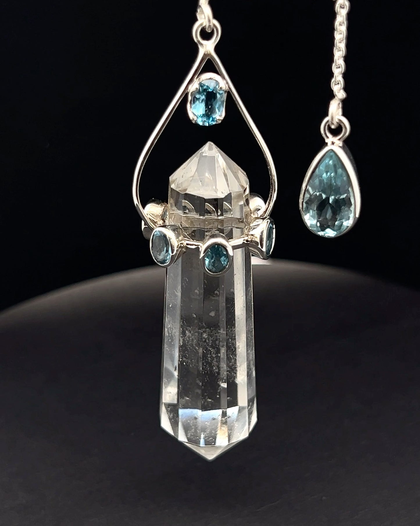Vogel Cut Double Terminated Crystal Point w/ 8 Facetted Blue Topaz in .925 Silver Setting  as a Pendulum
