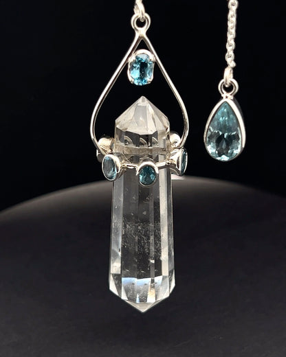 Vogel Cut Double Terminated Crystal Point w/ 8 Facetted Blue Topaz in .925 Silver Setting  as a Pendulum