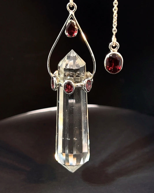 Vogel Cut Double Terminated Crystal Point w/ 8 Facetted Garnets in .925 Silver Setting  as a Pendulum