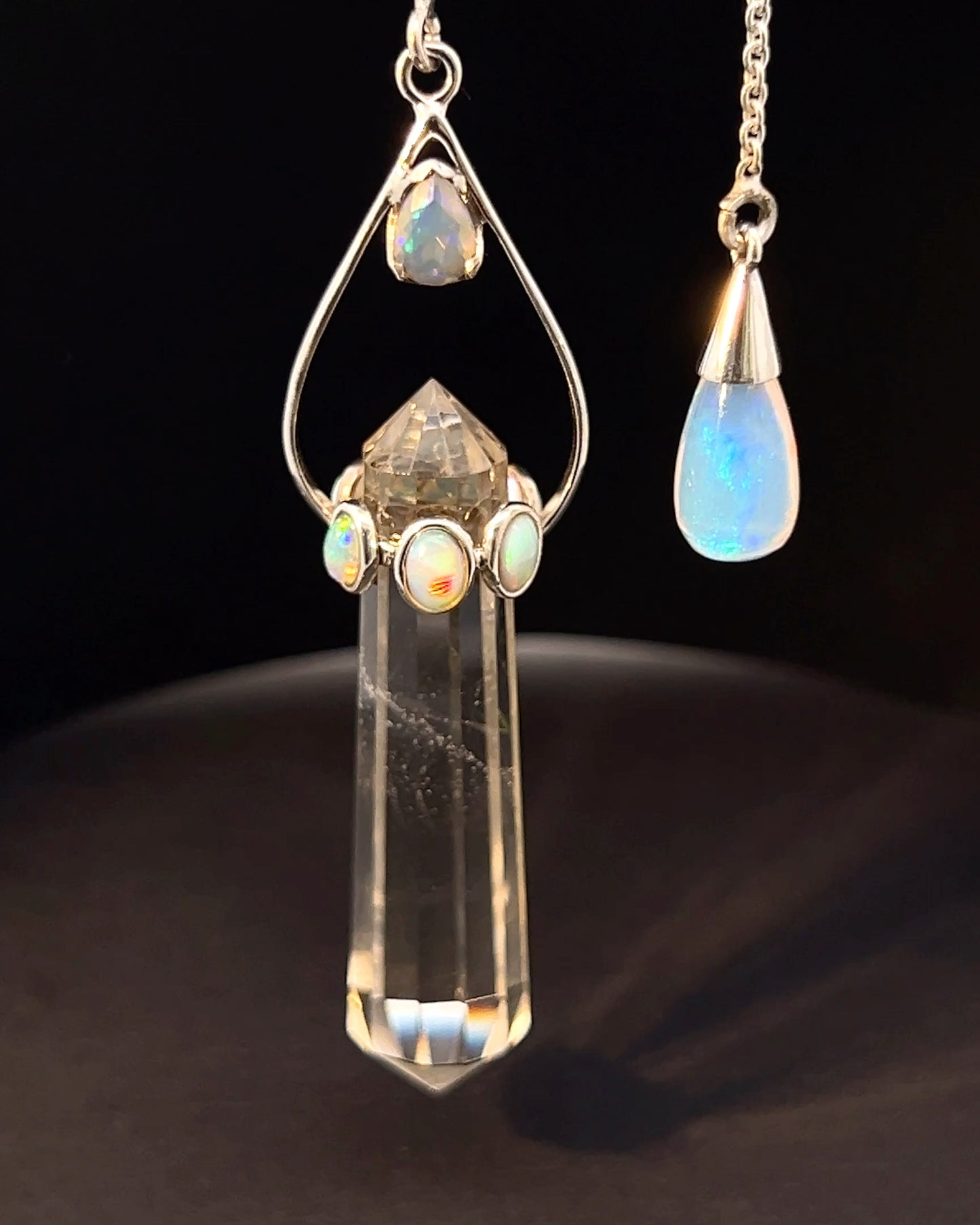 Vogel Cut Double Terminated Crystal Point w/ 7 Facetted  Ethiopian Opals and Opal Drop in .925 Silver Setting  as a Pendulum