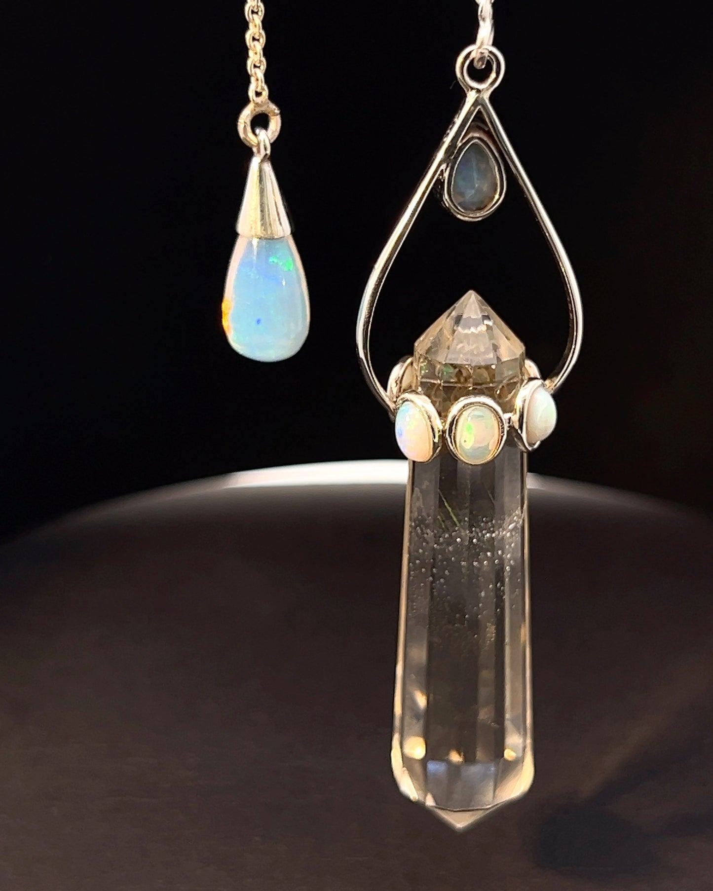 Vogel Cut Double Terminated Crystal Point w/ 7 Facetted  Ethiopian Opals and Opal Drop in .925 Silver Setting  as a Pendulum