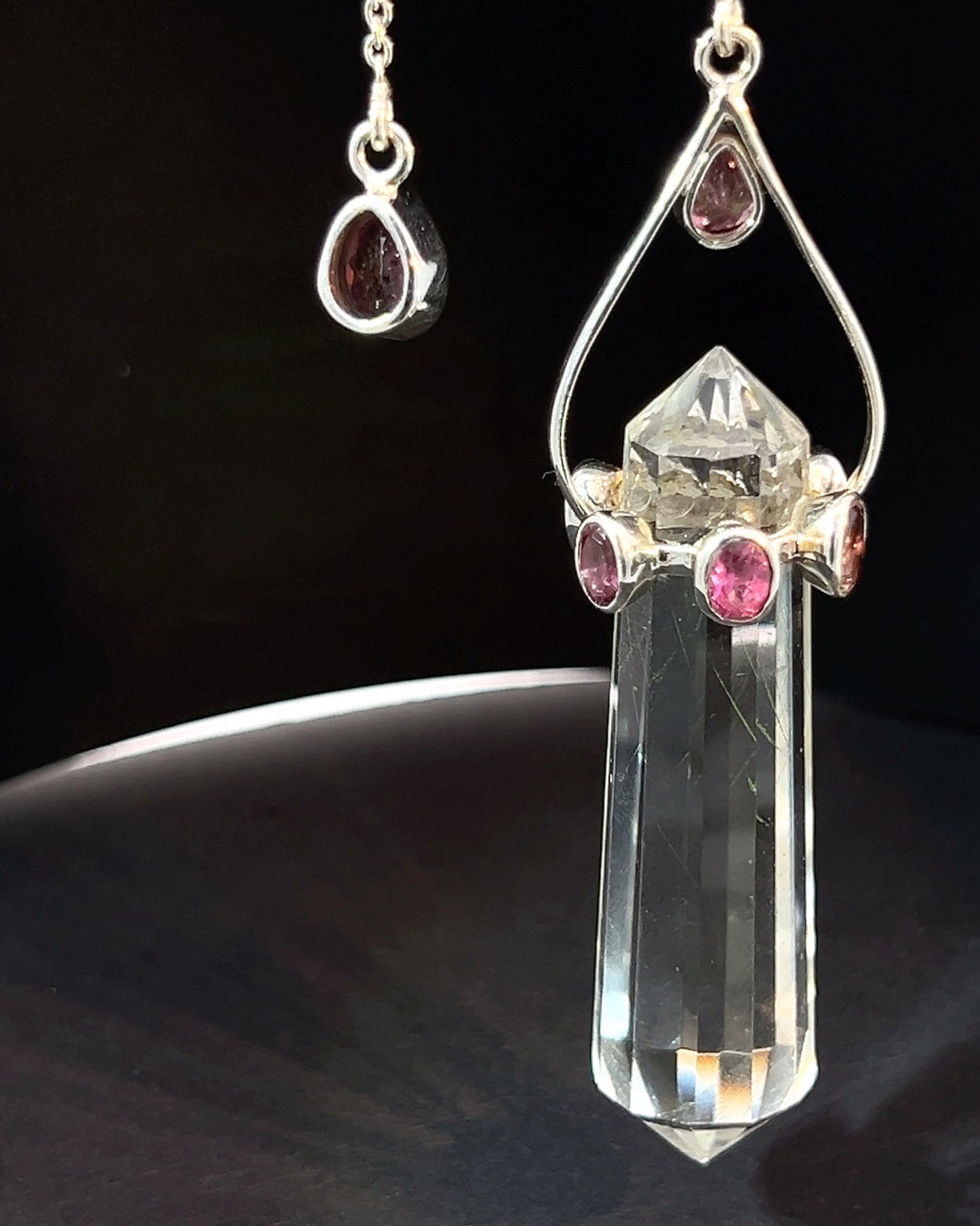 Vogel Cut Double Terminated Smoky Crystal Point with 7 Facetted  Red Turmalines in .925 Silver Setting  as a Pendulum