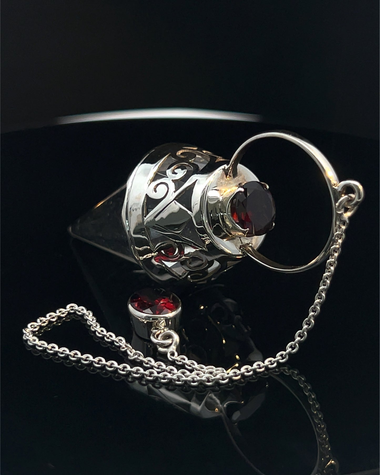 Vogel Cut Crystal Point w/ Facetted Garnets in Fancy .925 Silver Setting w/ Cutwork Design as a Pendulum