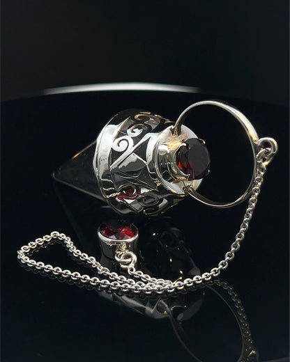 Vogel Cut Crystal Point w/ Facetted Garnets in Fancy .925 Silver Setting w/ Cutwork Design as a Pendulum