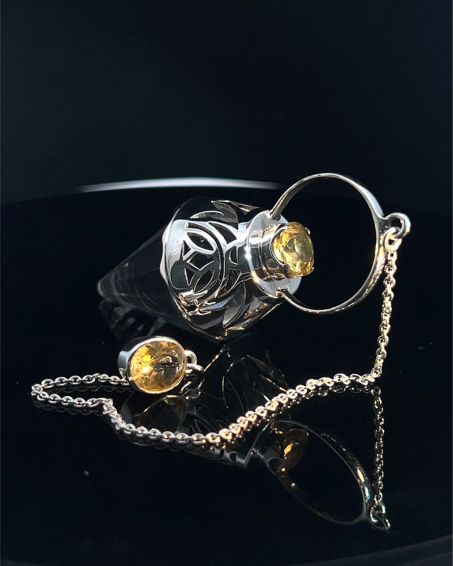 Vogel Cut Crystal Point with Facetted Citrines in Fancy .925 Silver Setting with Cutwork Design as a Pendulum