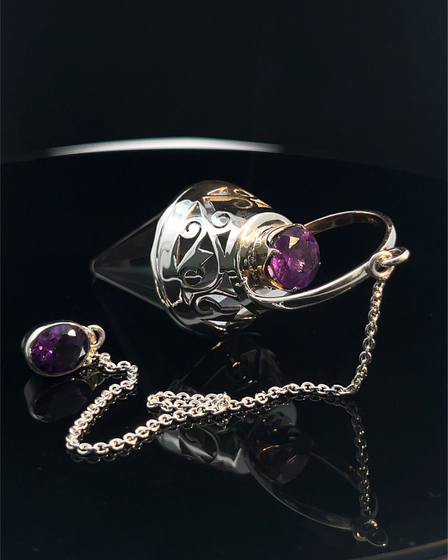 Vogel Cut Crystal Point with Facetted Amethysts in Fancy .925 Silver Setting with Cutwork Design as a Pendulum