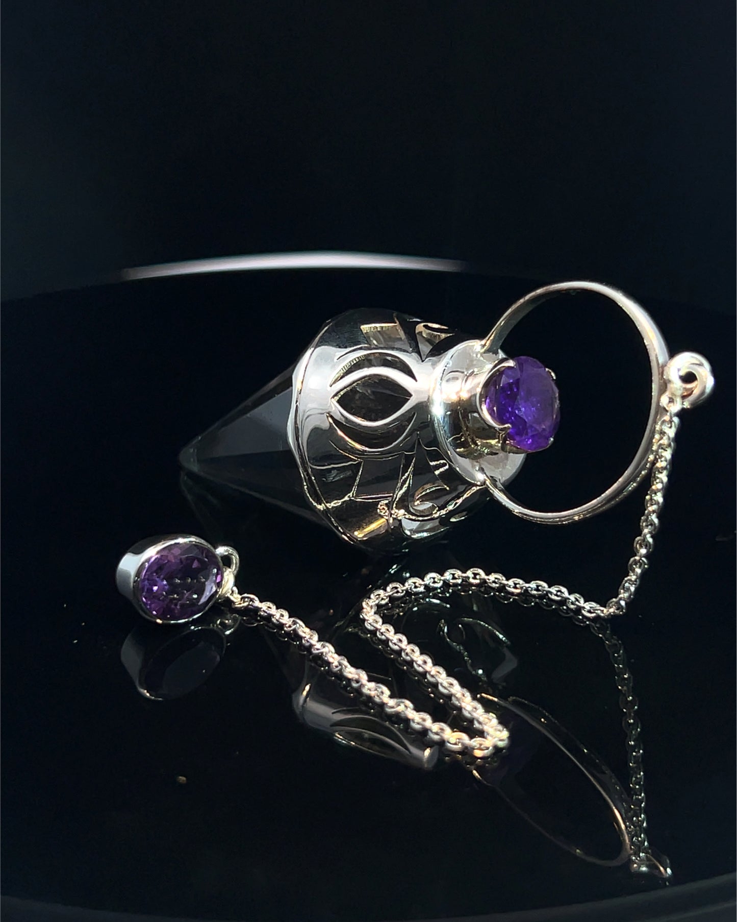Vogel Cut Crystal Point with Facetted Amethysts in Fancy .925 Silver Setting with Cutwork Design as a Pendulum