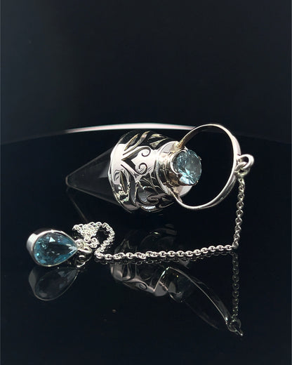 Vogel Cut Crystal Point w/ Facetted Blue Topaz in Fancy .925 Silver Setting w/ Cutwork Design as a Pendulum