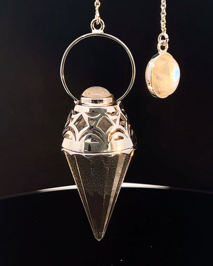 Vogel Cut Crystal Point w/ Rainbow Moonstone Cabachons in Fancy .925 Silver Setting w/ Cutwork Design as a Pendulum
