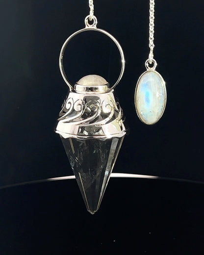 Vogel Cut Crystal Point w/ Rainbow Moonstone Cabachons in Fancy .925 Silver Setting w/ Cutwork Design as a Pendulum