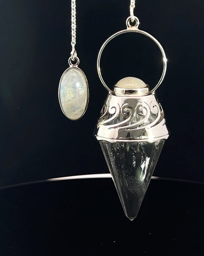 Vogel Cut Crystal Point w/ Rainbow Moonstone Cabachons in Fancy .925 Silver Setting w/ Cutwork Design as a Pendulum