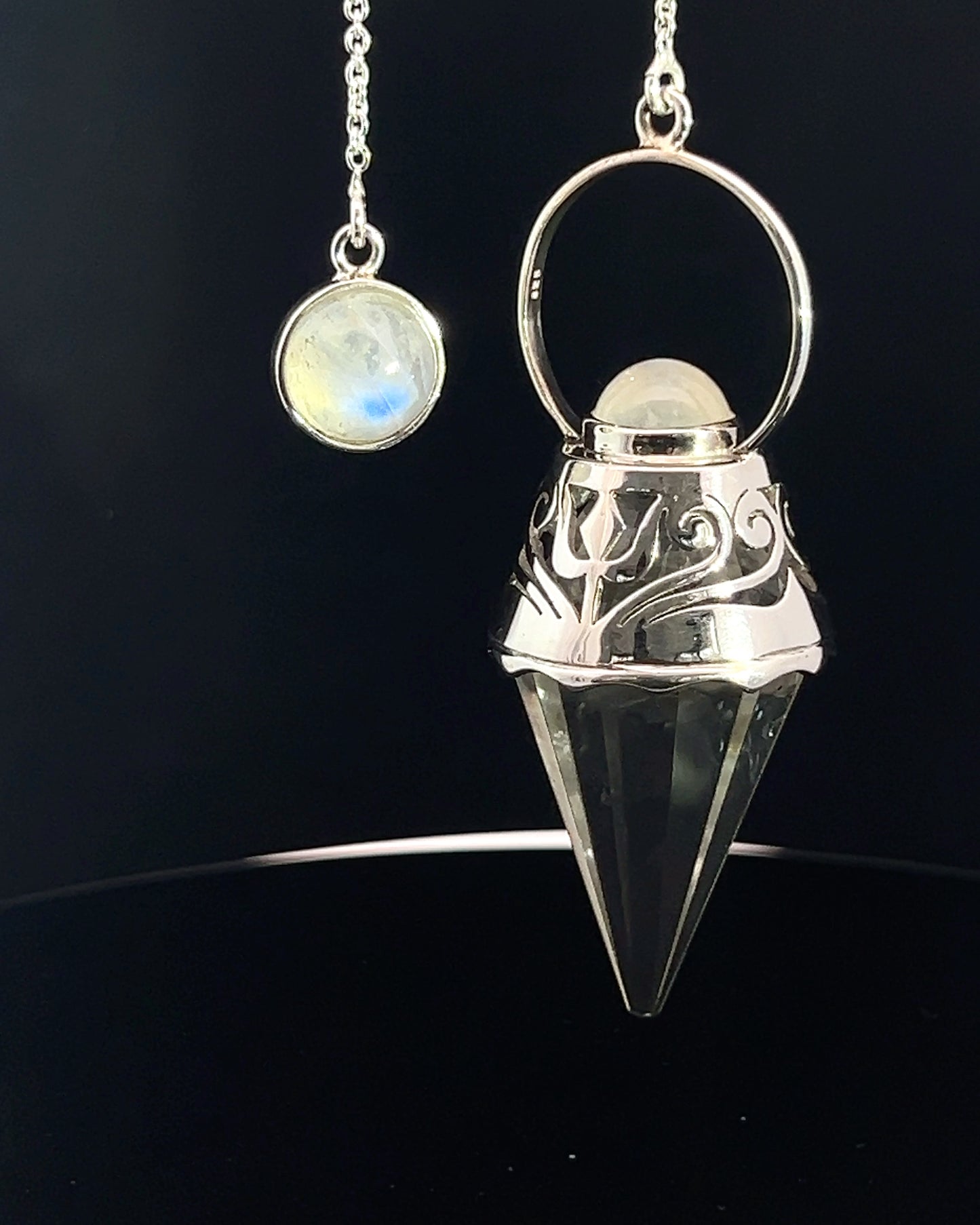 Vogel Cut Crystal Point w/ Rainbow Moonstone Cabachons in Fancy .925 Silver Setting w/ Cutwork Design as a Pendulum