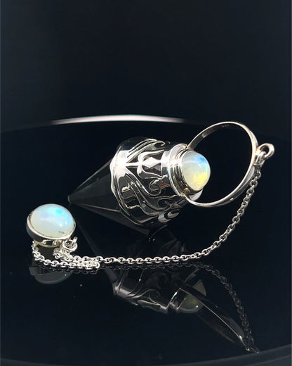Vogel Cut Crystal Point w/ Rainbow Moonstone Cabachons in Fancy .925 Silver Setting w/ Cutwork Design as a Pendulum