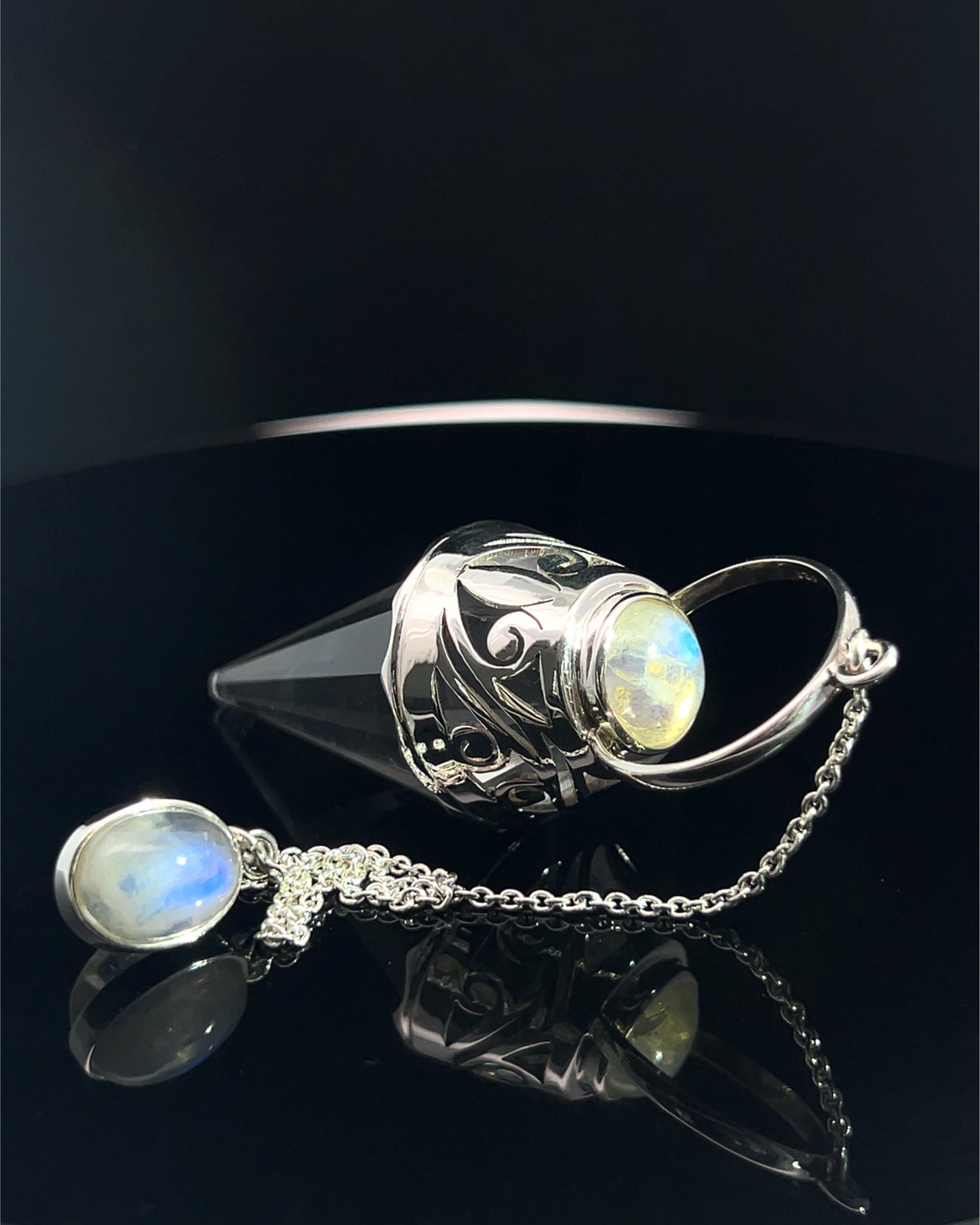 Vogel Cut Crystal Point w/ Rainbow Moonstone Cabochons in Fancy .925 Silver Setting w/ Cutwork Design as a Pendulum
