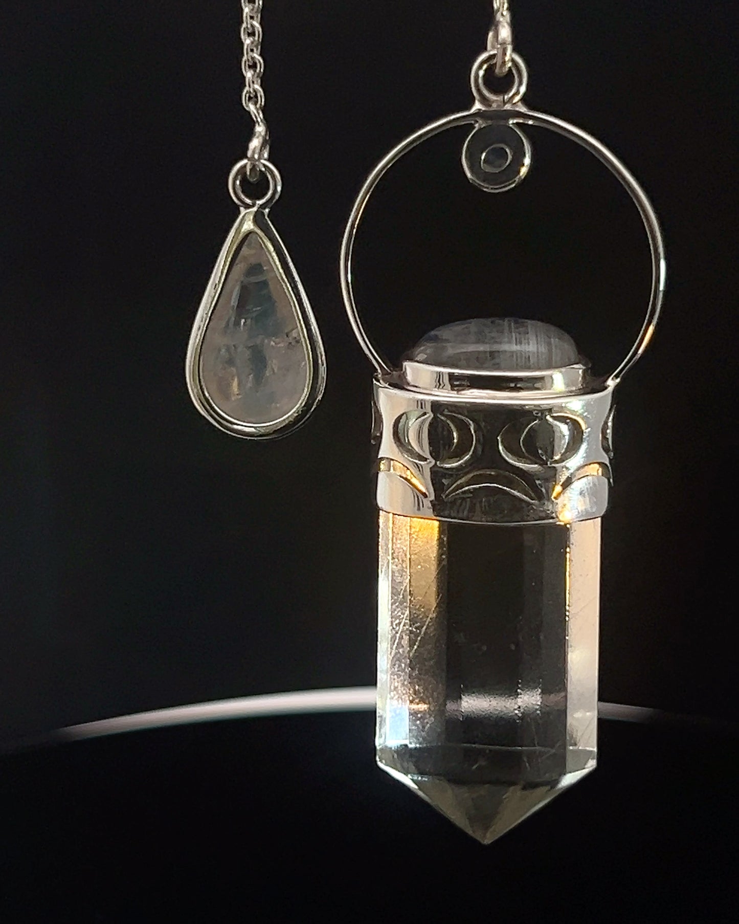 Straight 12 facet  Crystal Point w/ Rainbow Moonstone Cabachons Accents and Finger Loop in Fancy .925 Silver Setting w/ Moon Cutwork Design as a Pendulum