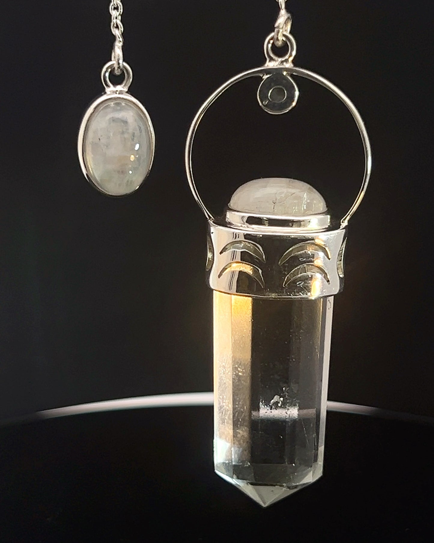 Straight 12 facet  Crystal Point w/ Rainbow Moonstone Cabochons Accents and Finger Loop in Fancy .925 Silver Setting w/ Moon Cutwork Design as a Pendulum