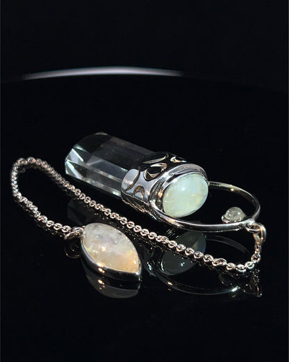 Straight 12 facet  Crystal Point w/ Rainbow Moonstone Cabachons Accents and Finger Loop in Fancy .925 Silver Setting w/ Moon Cutwork Design as a Pendulum