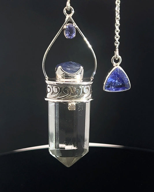Straight 12 facet Crystal Point w/ Facetted Tanzanite  & Diamond Accents in .925 Silver Setting w/ Fancy Cutwork Design as a Pendulum