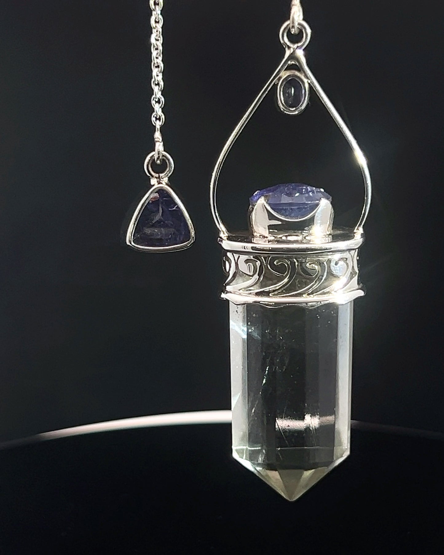 Straight 12 facet Crystal Point w/ Facetted Tanzanite  & Diamond Accents in .925 Silver Setting w/ Fancy Cutwork Design as a Pendulum