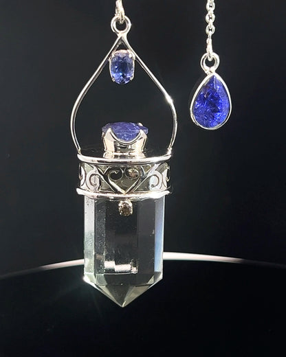 Straight 12 facet Crystal Point w/ Facetted Tanzanite  & Diamond Accents in .925 Silver Setting w/ Fancy Cutwork Design as a Pendulum