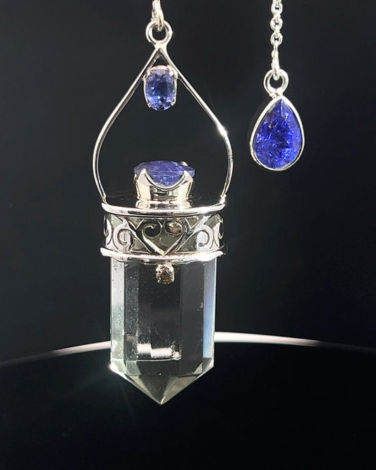Straight 12 facet Crystal Point w/ Facetted Tanzanite  & Diamond Accents in .925 Silver Setting w/ Fancy Cutwork Design as a Pendulum