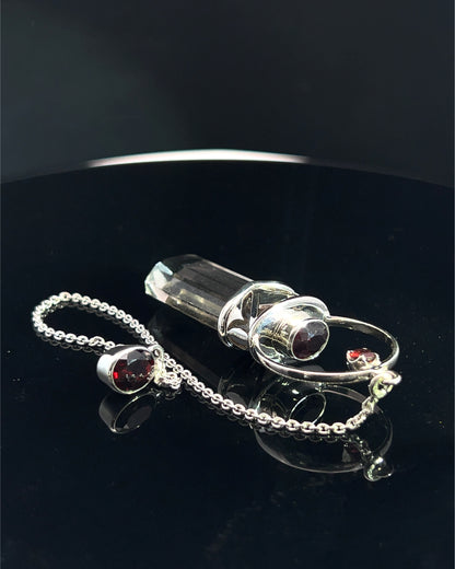 Straight 12 facet Crystal Point w/ Facetted Garnet Accents in .925 Silver Setting w/ Fancy Cutwork Design as a Pendulum
