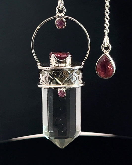 Straight 12 facet Crystal Point w/ Facetted Red Turmaline Accents in .925 Silver Setting w/ Fancy Cutwork Patterns as a Pendulum