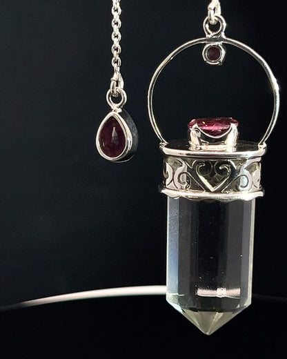 Straight 12 facet Crystal Point w/ Facetted Red Turmaline Accents in .925 Silver Setting w/ Fancy Cutwork Patterns as a Pendulum