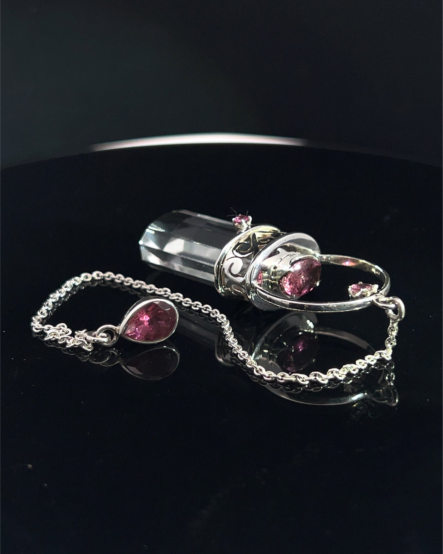 Straight 12 facet Crystal Point w/ Facetted Red Turmaline Accents in .925 Silver Setting w/ Fancy Cutwork Patterns as a Pendulum