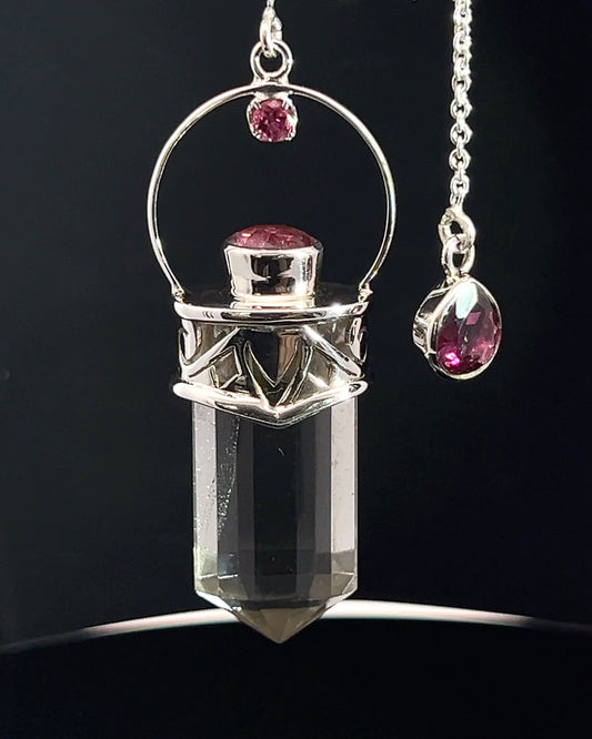 Straight 12 facet Crystal Point w/ Facetted Red Turmaline Accents in .925 Silver Setting w/ Fancy Cutwork Patterns as a Pendulum