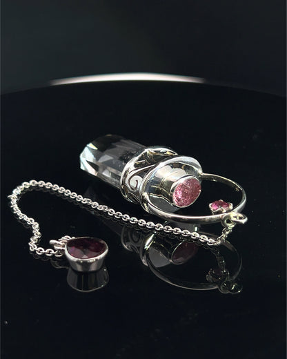 Straight 12 facet Crystal Point w/ Facetted Red Turmaline Accents in .925 Silver Setting w/ Fancy Cutwork Patterns as a Pendulum