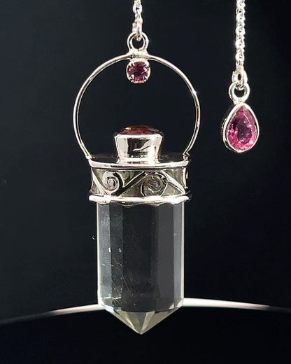 Straight 12 facet Crystal Point w/ Facetted Red Turmaline Accents in .925 Silver Setting w/ Fancy Cutwork Patterns as a Pendulum