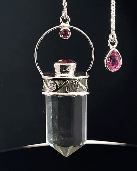 Straight 12 facet Crystal Point w/ Facetted Red Turmaline Accents in .925 Silver Setting w/ Fancy Cutwork Patterns as a Pendulum