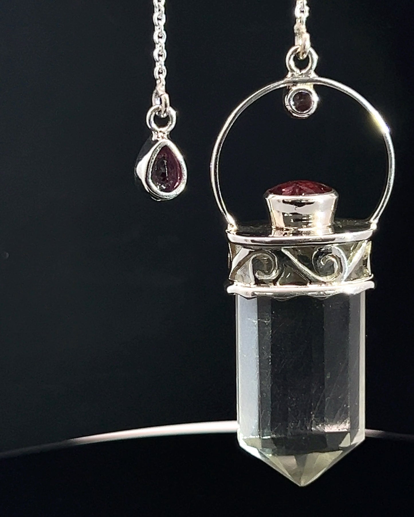 Straight 12 facet Crystal Point w/ Facetted Red Turmaline Accents in .925 Silver Setting w/ Fancy Cutwork Patterns as a Pendulum
