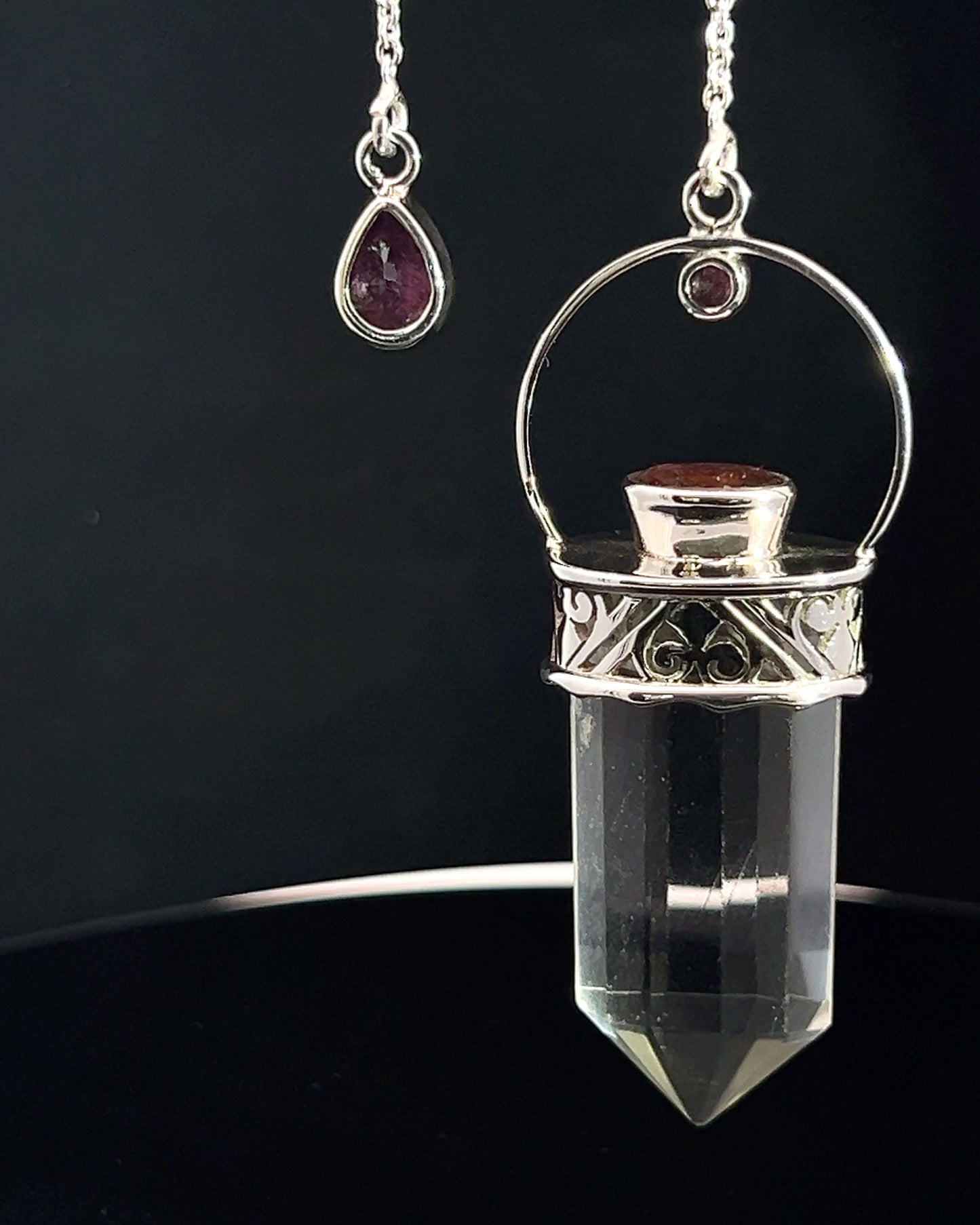 Straight 12 facet Crystal Point w/ Facetted Red Turmaline Accents in .925 Silver Setting w/ Fancy Cutwork Patterns as a Pendulum
