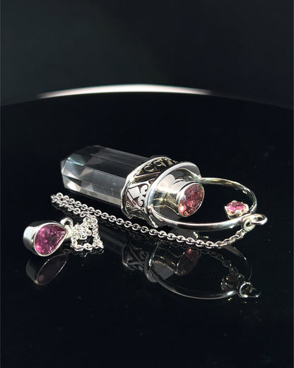Straight 12 facet Crystal Point w/ Facetted Red Turmaline Accents in .925 Silver Setting w/ Fancy Cutwork Patterns as a Pendulum