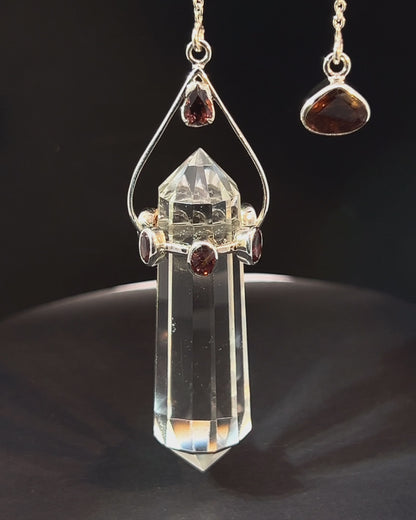 Vogel Cut Double Terminated Crystal Point with 7 Facetted  Red Turmalines in .925 Silver Setting  as a Pendulum