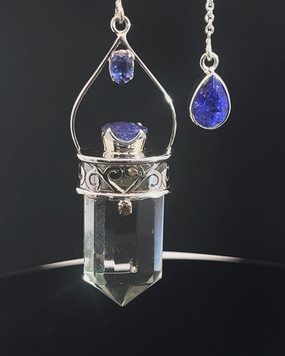 Straight 12 facet Crystal Point w/ Facetted Tanzanite  & Diamond Accents in .925 Silver Setting w/ Fancy Cutwork Design as a Pendulum