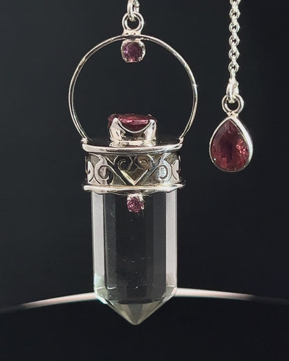 Straight 12 facet Crystal Point w/ Facetted Red Turmaline Accents in .925 Silver Setting w/ Fancy Cutwork Patterns as a Pendulum