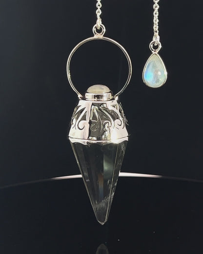 Vogel Cut Crystal Point w/ Rainbow Moonstone Cabachons in Fancy .925 Silver Setting w/ Cutwork Design as a Pendulum