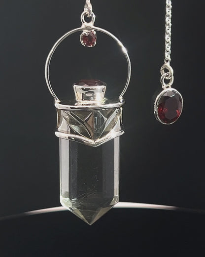 Straight 12 facet Crystal Point w/ Facetted Garnet Accents in .925 Silver Setting w/ Fancy Cutwork Design as a Pendulum