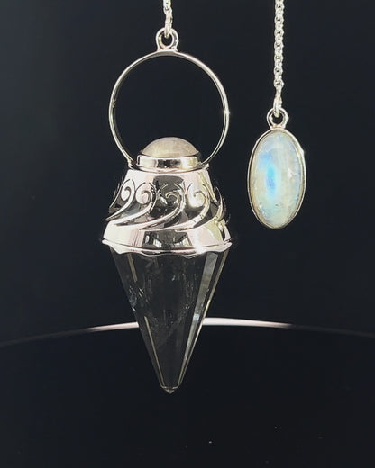 Vogel Cut Crystal Point w/ Rainbow Moonstone Cabachons in Fancy .925 Silver Setting w/ Cutwork Design as a Pendulum
